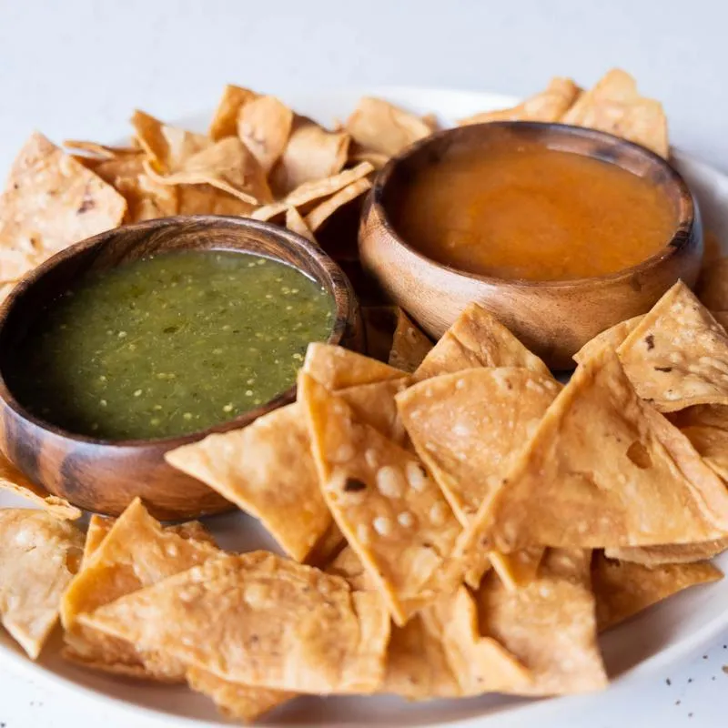 Tortilla chips with two house salsas, one roja and one verde