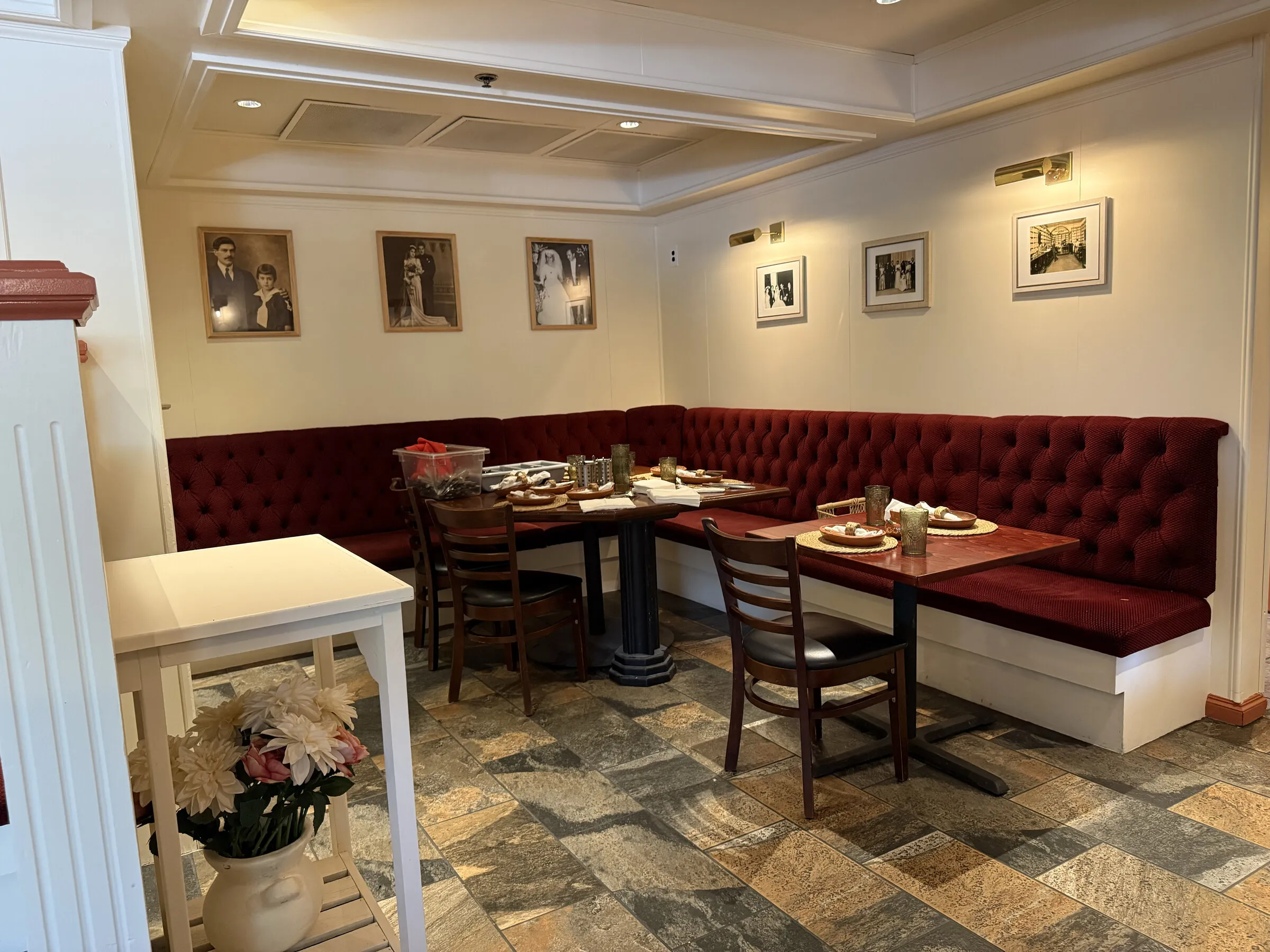 The Panfila dining room set throughout with the restaurant’s terracotta plates, woven placemats and smoky olive glasses